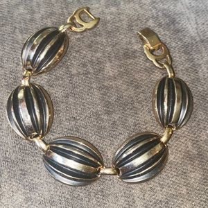 Pretty black and gold tone link bracelet